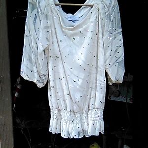 Women's blouse with sequences embezzled